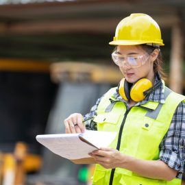 A asian girl construction engineer at construction site